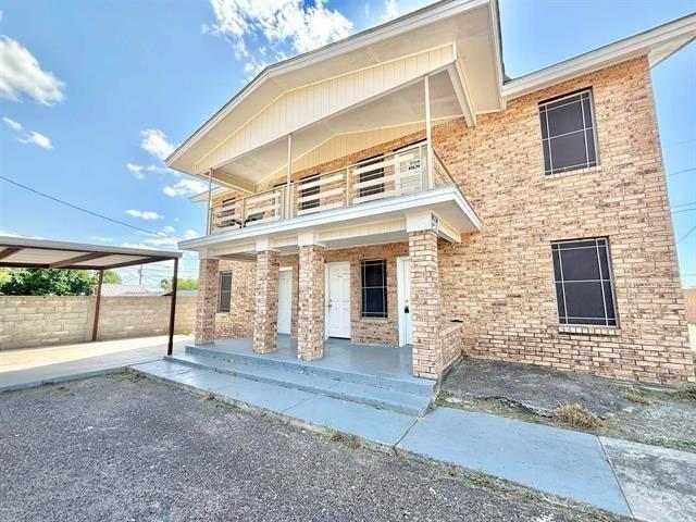 1109 Jackson Street Zapata, TX 78076 - Photo 2 of 30 a view of a building with an outdoor space