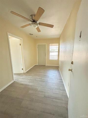 1109 Jackson Street Zapata, TX 78076 - Photo 22 of 30 a view of an empty room and window