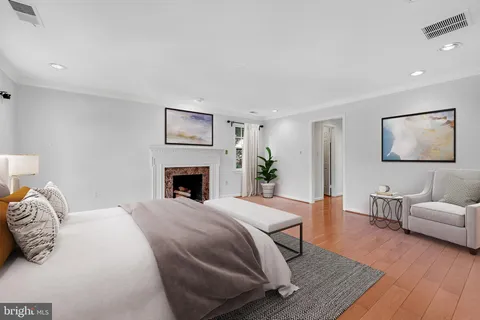 a bedroom with a bed and furniture