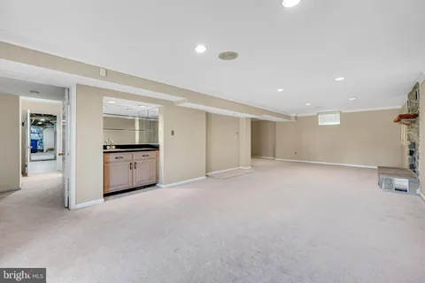 a view of an empty room with a windows