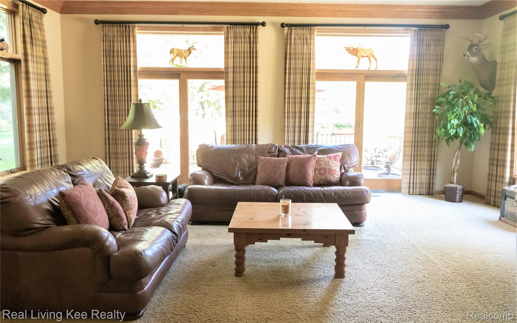 4125 Curtis Road Leonard, MI 48367 - Photo 15 of 35 Living Room deck.jpg