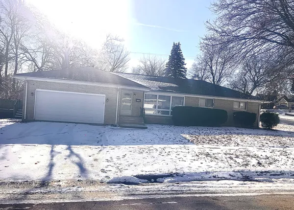 a view of a yard and a house