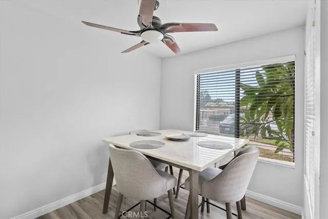 a kitchen with stainless steel appliances a stove a sink a microwave and cabinets