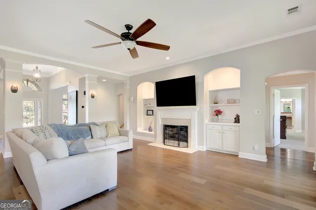 a large kitchen with stainless steel appliances granite countertop a stove a sink and a refrigerator