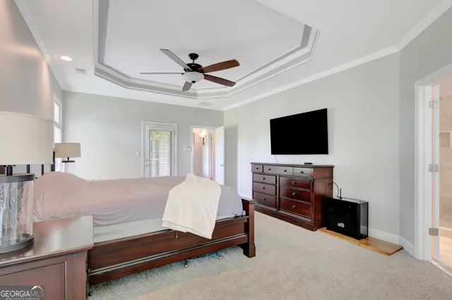 a view of cabinets and wooden floor