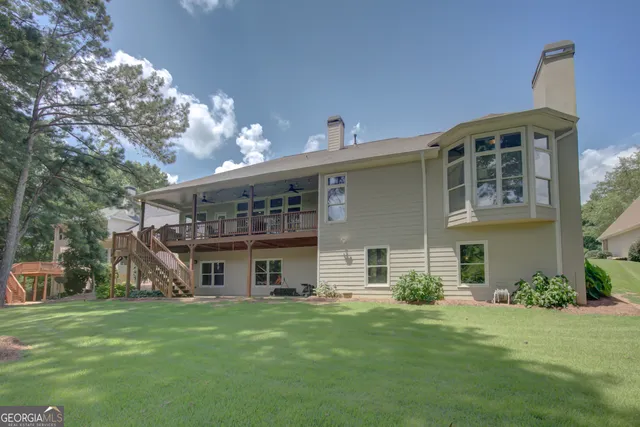 a view of a park with swings and slides
