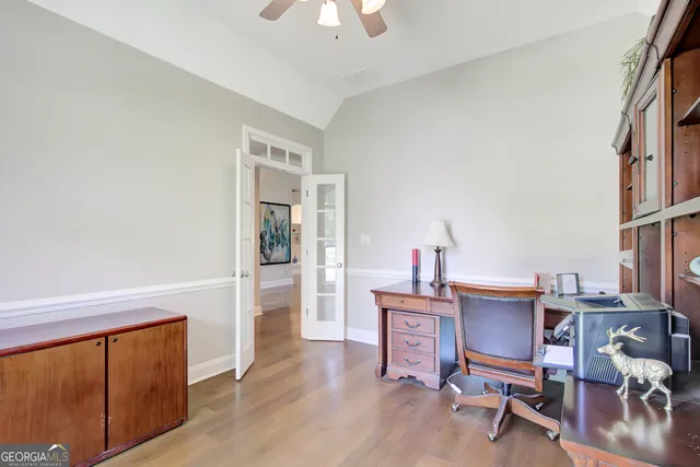 a view of a hallway with closet and a livingroom view