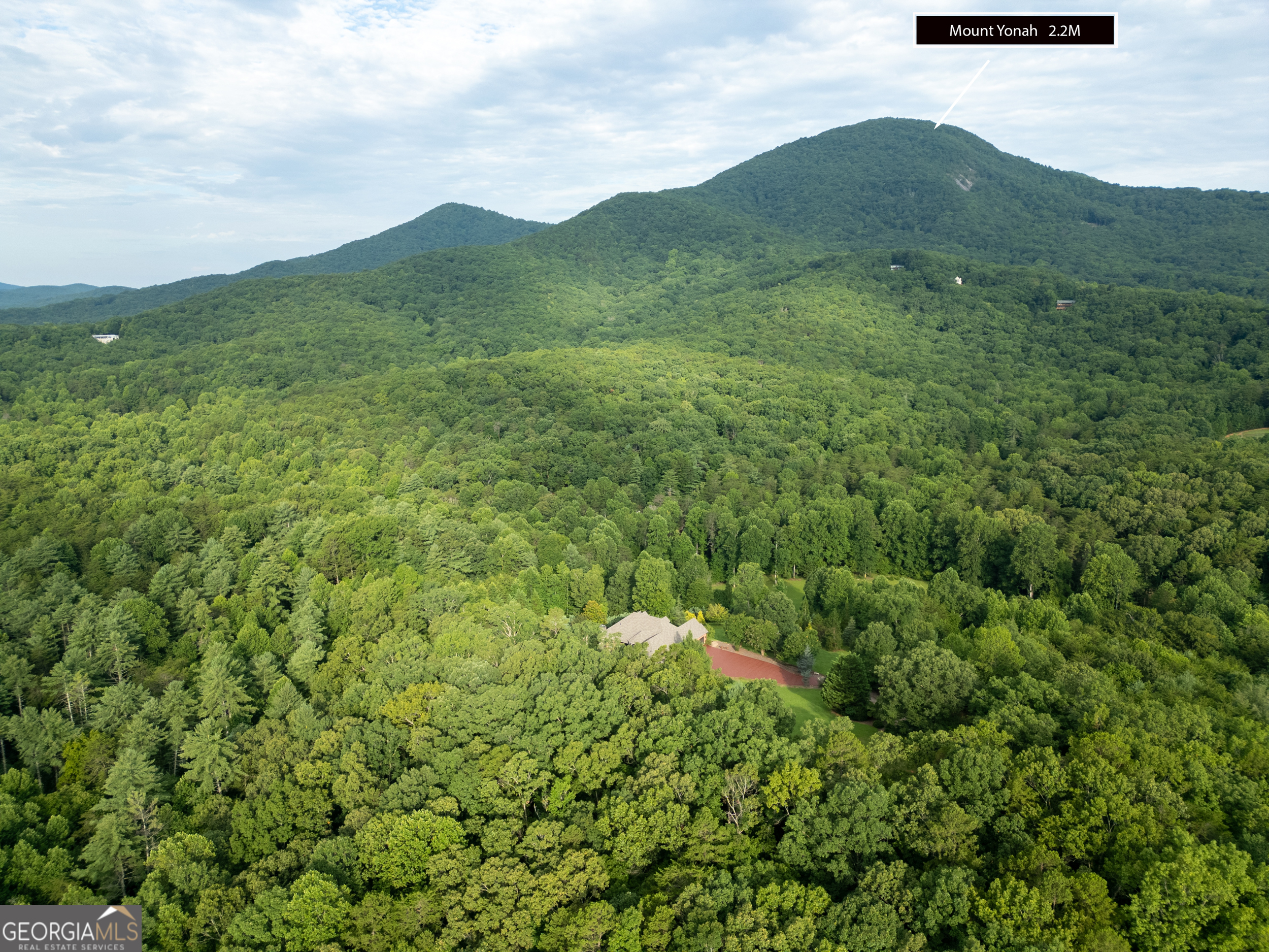 0 Duncan Bridge Road Cleveland, GA 30528 - Photo 2 of 11 a view of a lush green hillside and mountains