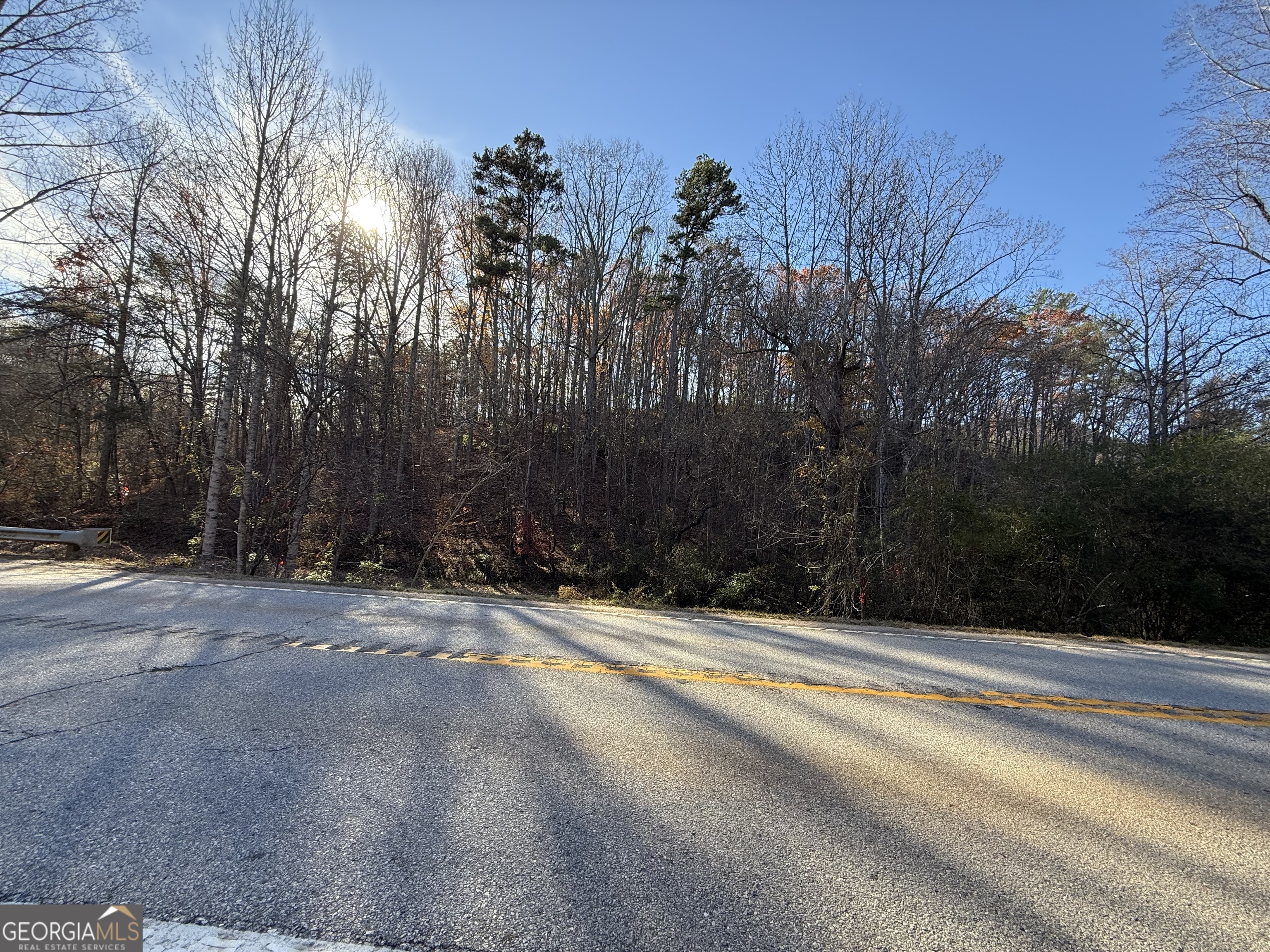 0 Duncan Bridge Road Cleveland, GA 30528 - Photo 9 of 11 a view of a house with a yard and pathway