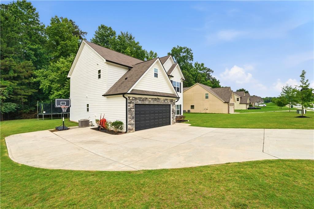 956 Fellowship Road Fairburn, GA 30213 - Photo 2 of 35