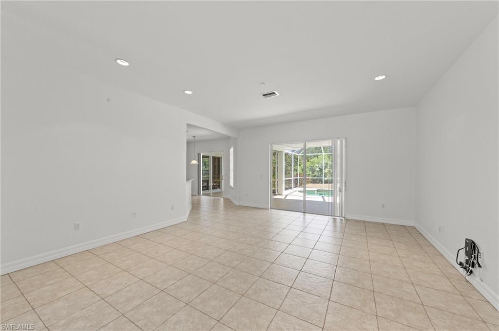 9623 Springlake Circle Estero, FL 33928 - Photo 11 of 47 a view of an empty room with a window
