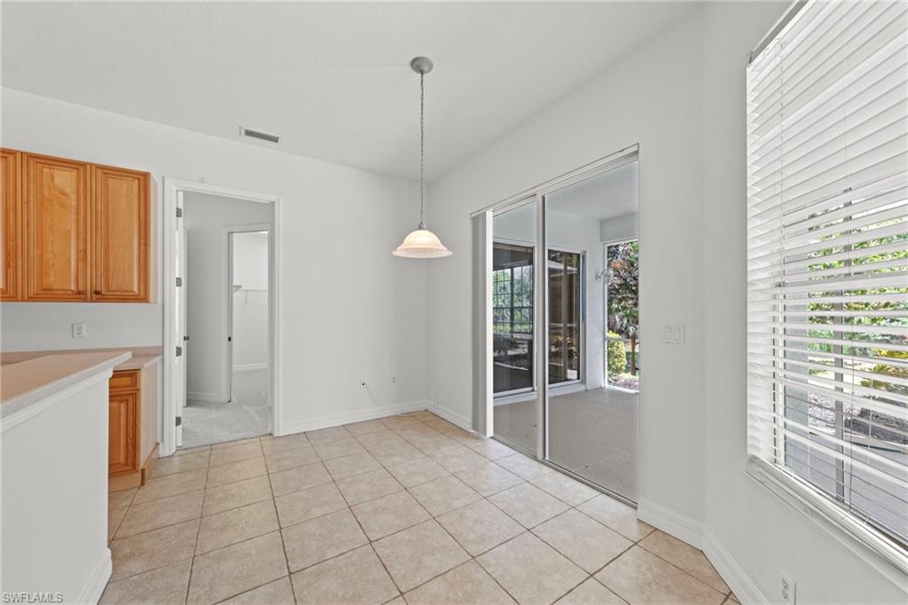 9623 Springlake Circle Estero, FL 33928 - Photo 19 of 47 a view of an empty room with a window