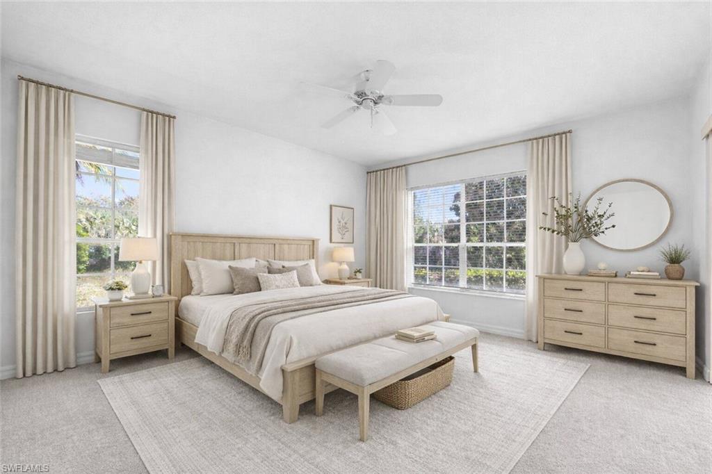 9623 Springlake Circle Estero, FL 33928 - Photo 20 of 47 a bedroom with a bed and a dresser