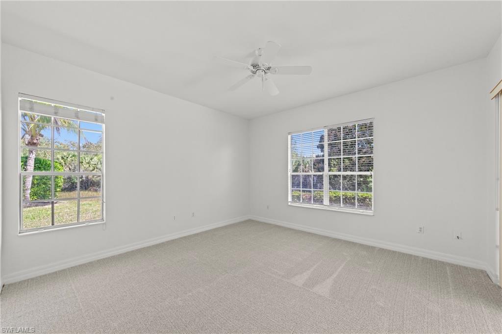 9623 Springlake Circle Estero, FL 33928 - Photo 21 of 47 an empty room with a window