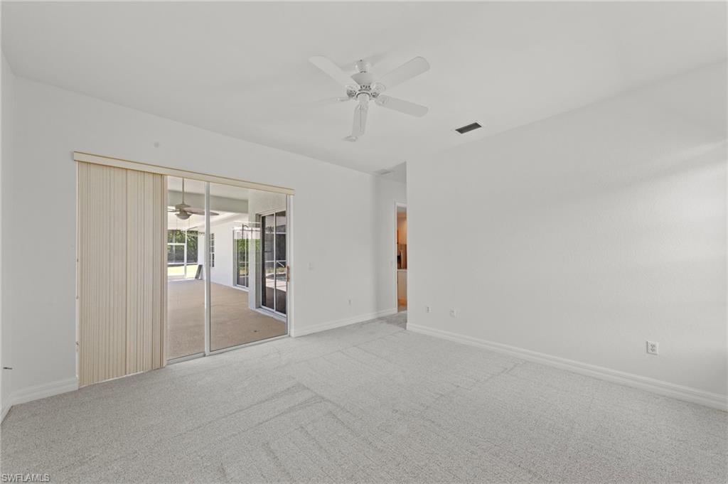 9623 Springlake Circle Estero, FL 33928 - Photo 22 of 47 a view of an empty room with a window