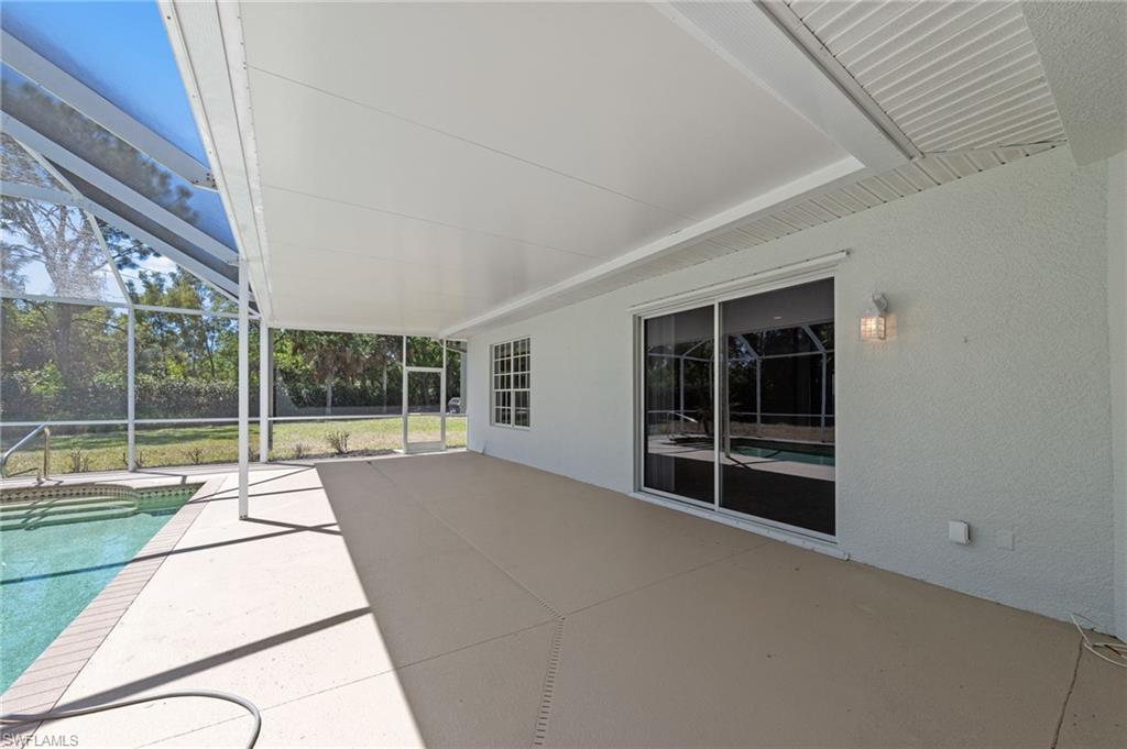 9623 Springlake Circle Estero, FL 33928 - Photo 33 of 47 a view of an empty room with a balcony