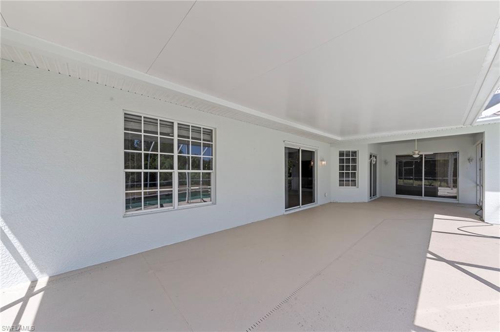 9623 Springlake Circle Estero, FL 33928 - Photo 34 of 47 a view of an empty room with a window and fireplace