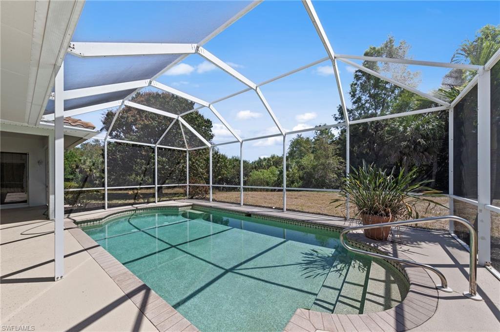 9623 Springlake Circle Estero, FL 33928 - Photo 39 of 47 a house view with a seating space and a potted plant