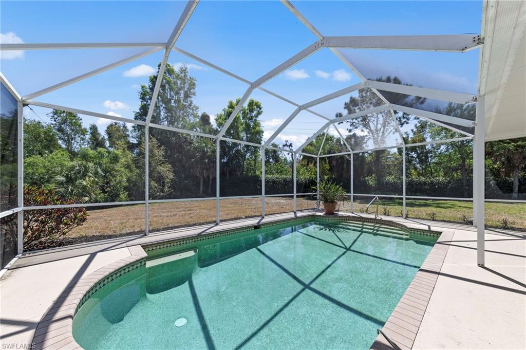 9623 Springlake Circle Estero, FL 33928 - Photo 41 of 47 a view of a house with a swimming pool