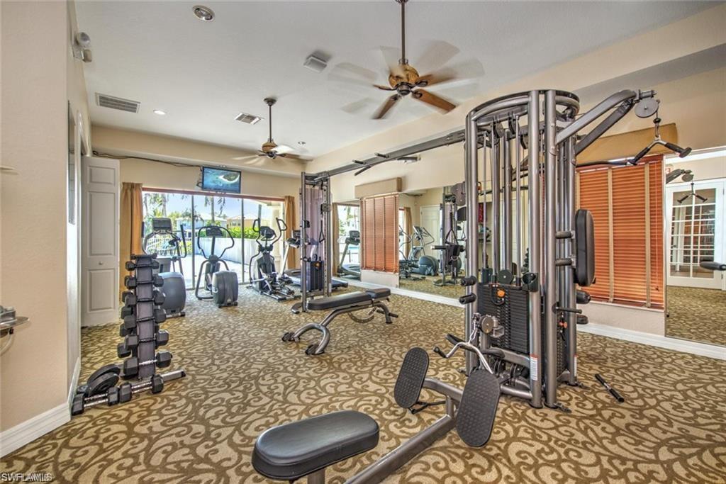 9623 Springlake Circle Estero, FL 33928 - Photo 47 of 47 a room with gym equipment and large window