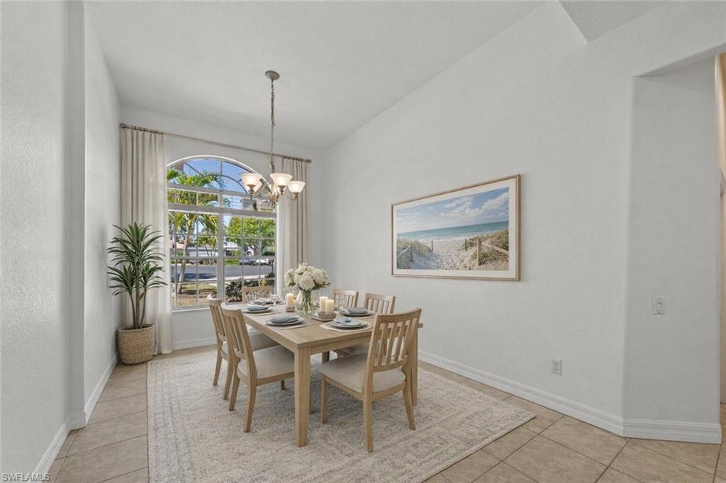 9623 Springlake Circle Estero, FL 33928 - Photo 7 of 47 a dining room with furniture and window
