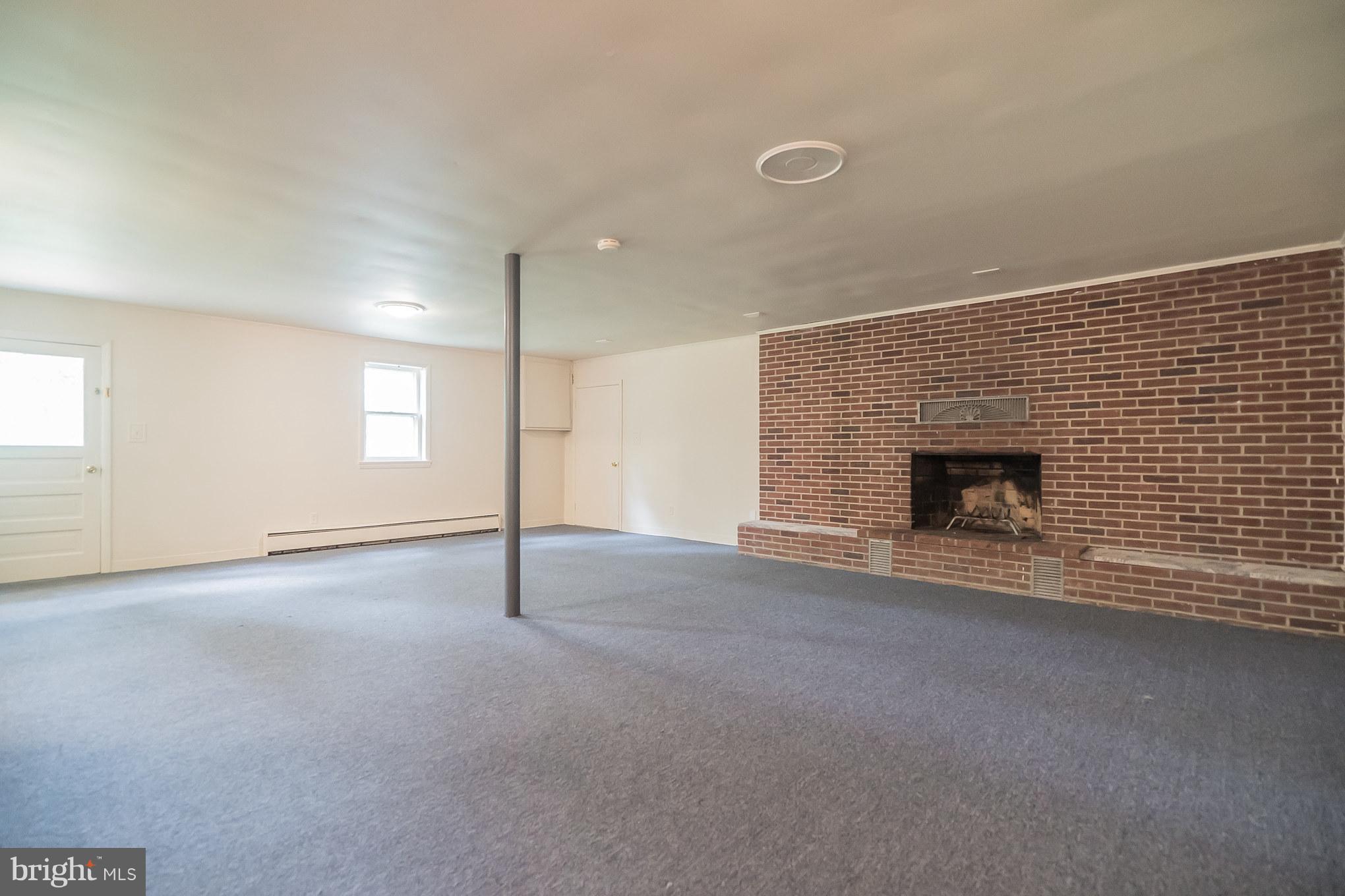 6146 Ridge Road Mount Airy, MD 21771 - Photo 25 of 29 Walk Out Basement~ - wood fire place