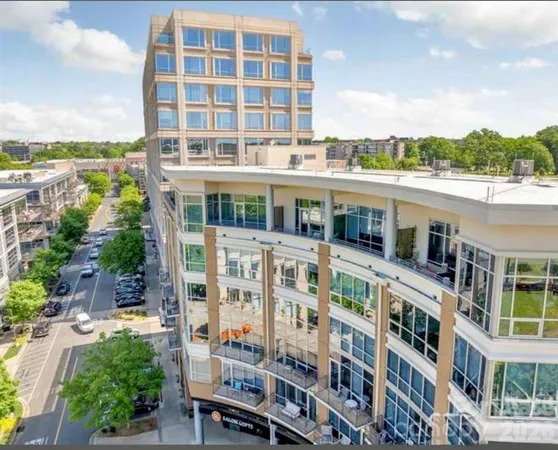 a view of a building with a garden space