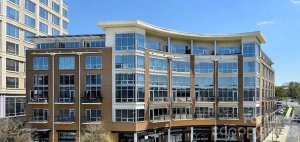 a front view of a building with glass windows