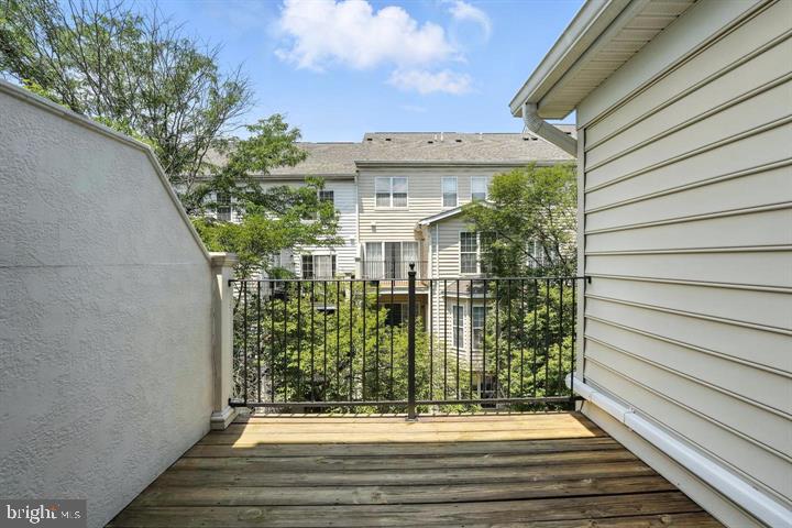 1547 Northern Neck Drive, Unit 201 Vienna, VA 22182 - Photo 11 of 23 a view of a house with a garden