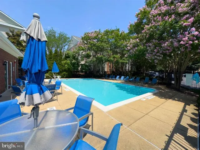 a view of an chairs and tables in the patio