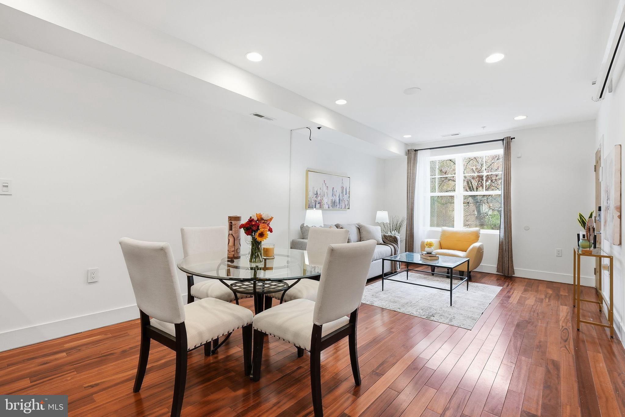1512 F Street Northeast, Unit 2 Washington, DC 20002 - Photo 11 of 37 Bright and airy living space with modern charm.