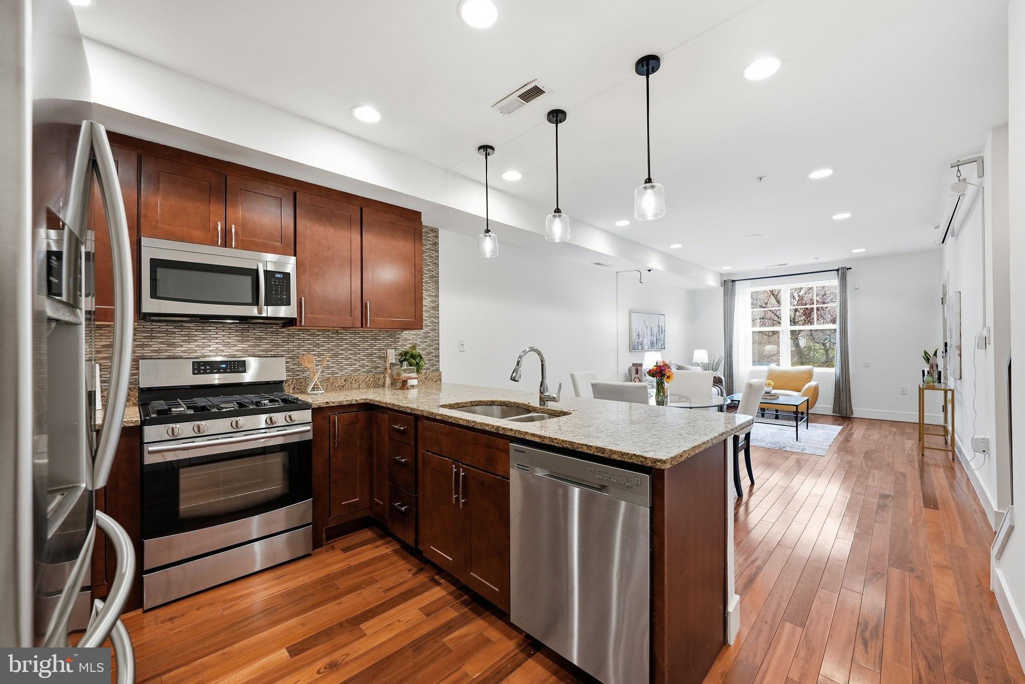 1512 F Street Northeast, Unit 2 Washington, DC 20002 - Photo 12 of 37 Modern kitchen with sleek finishes.