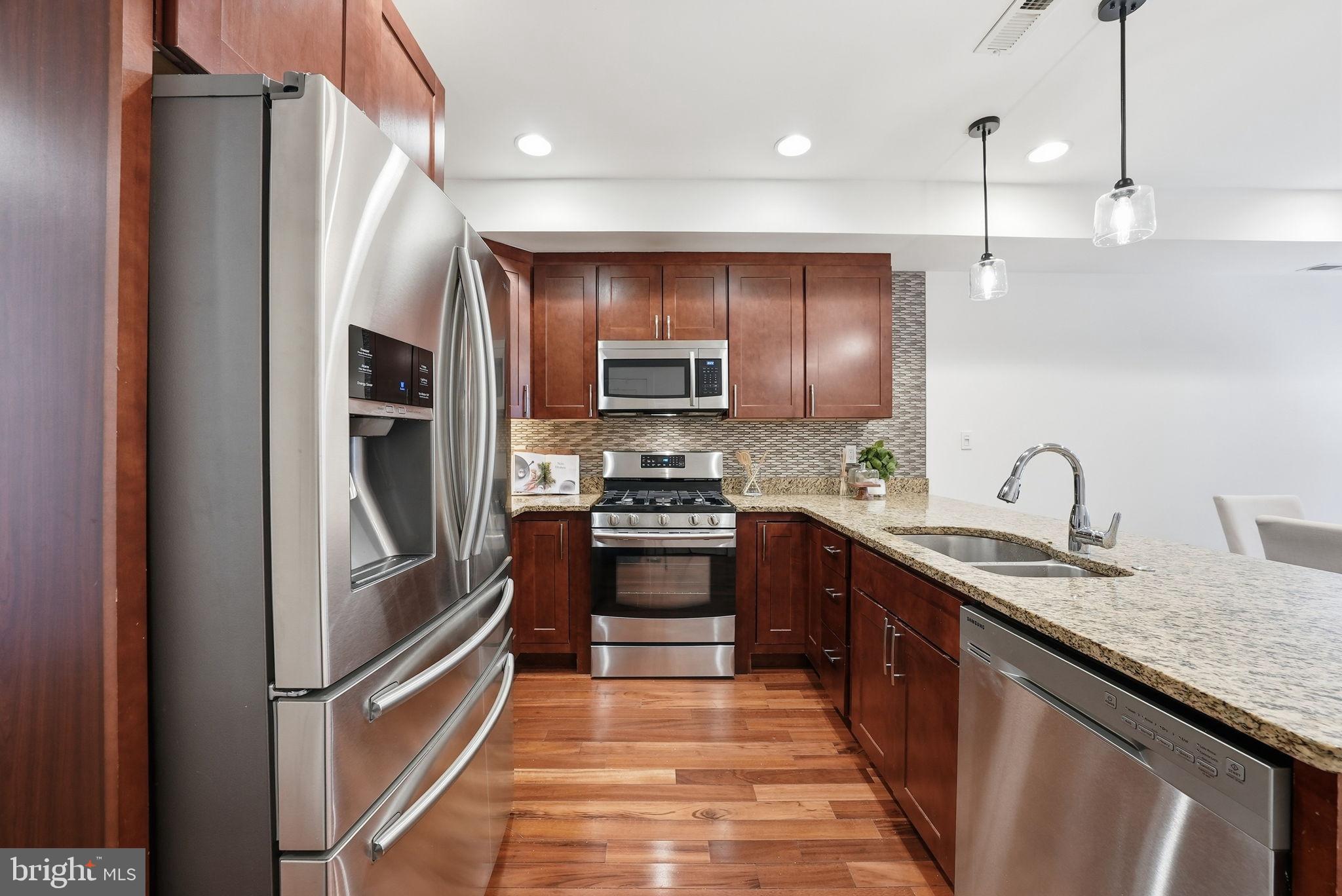 1512 F Street Northeast, Unit 2 Washington, DC 20002 - Photo 15 of 37 Modern kitchen with sleek finishes.