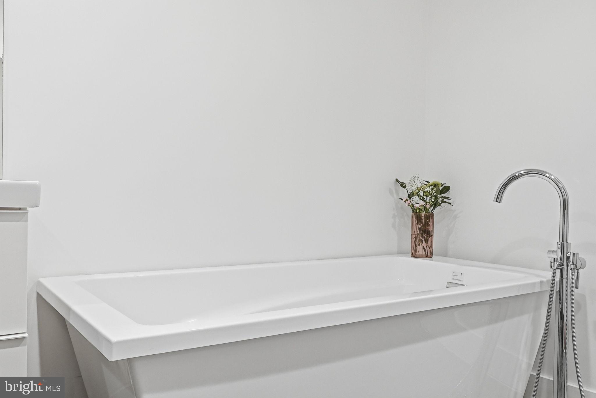 1512 F Street Northeast, Unit 2 Washington, DC 20002 - Photo 25 of 37 Serene modern bathroom oasis.
