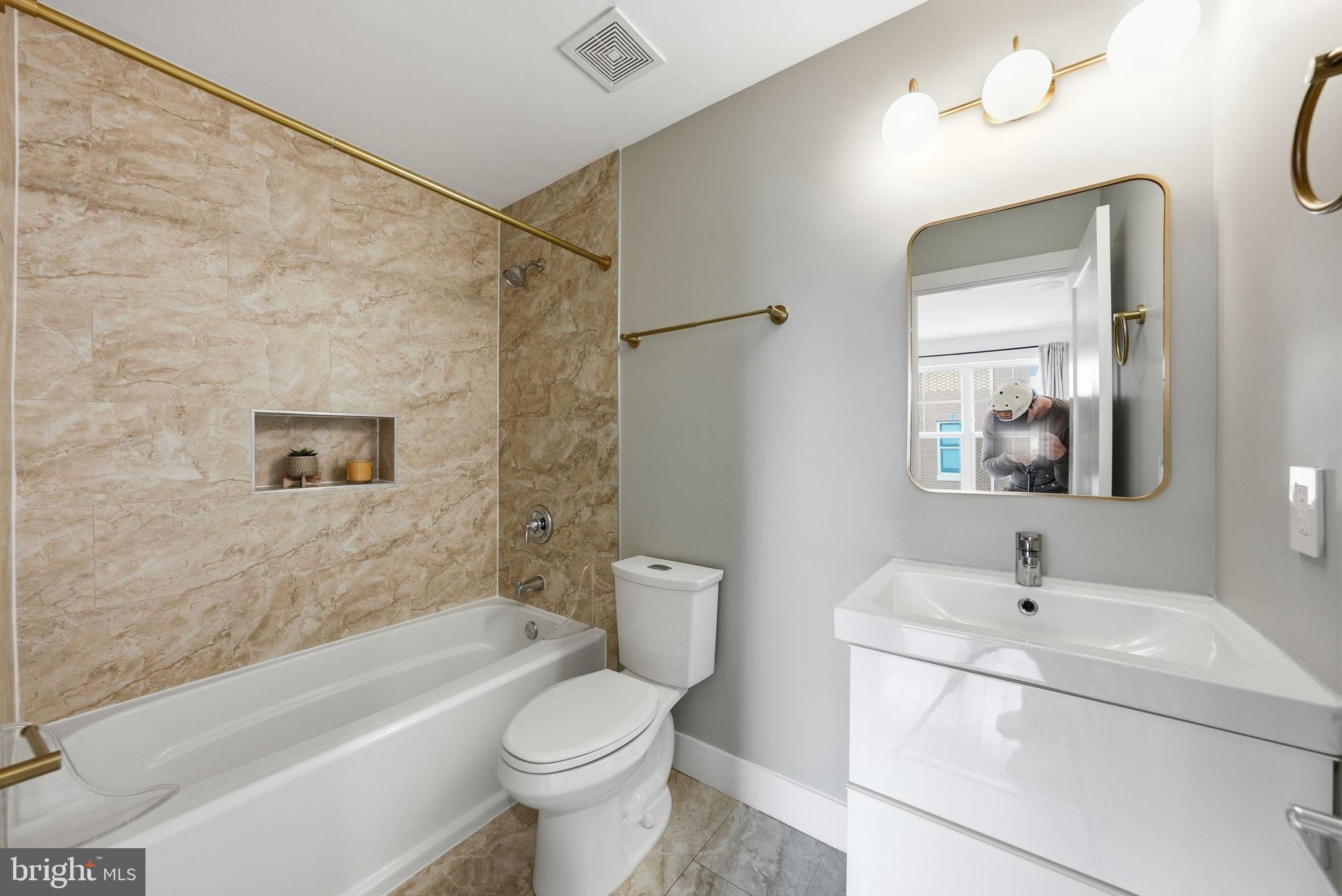1512 F Street Northeast, Unit 2 Washington, DC 20002 - Photo 27 of 37 Elegant bathroom with modern finishes.