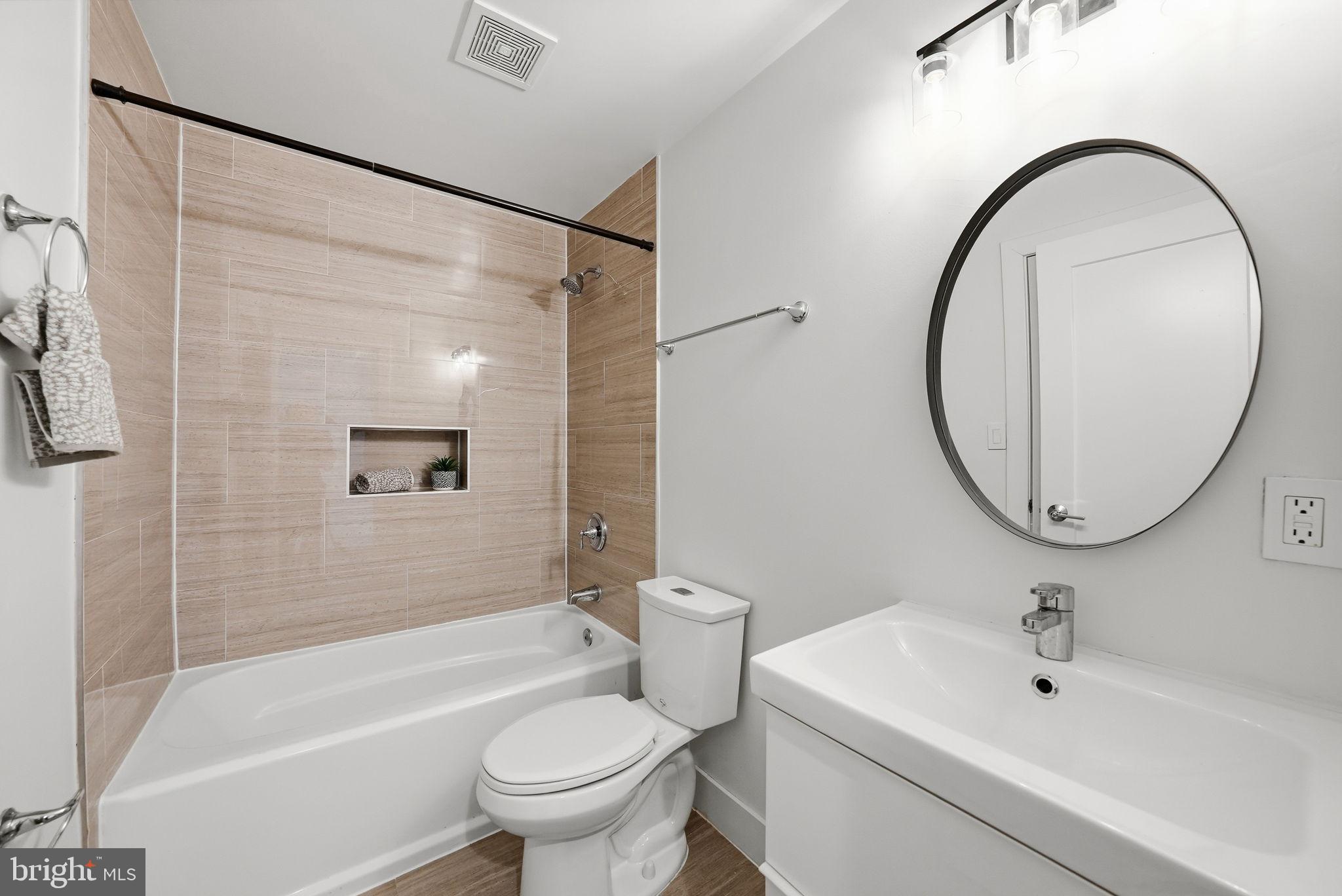 1512 F Street Northeast, Unit 2 Washington, DC 20002 - Photo 30 of 37 Modern bathroom with sleek finishes.