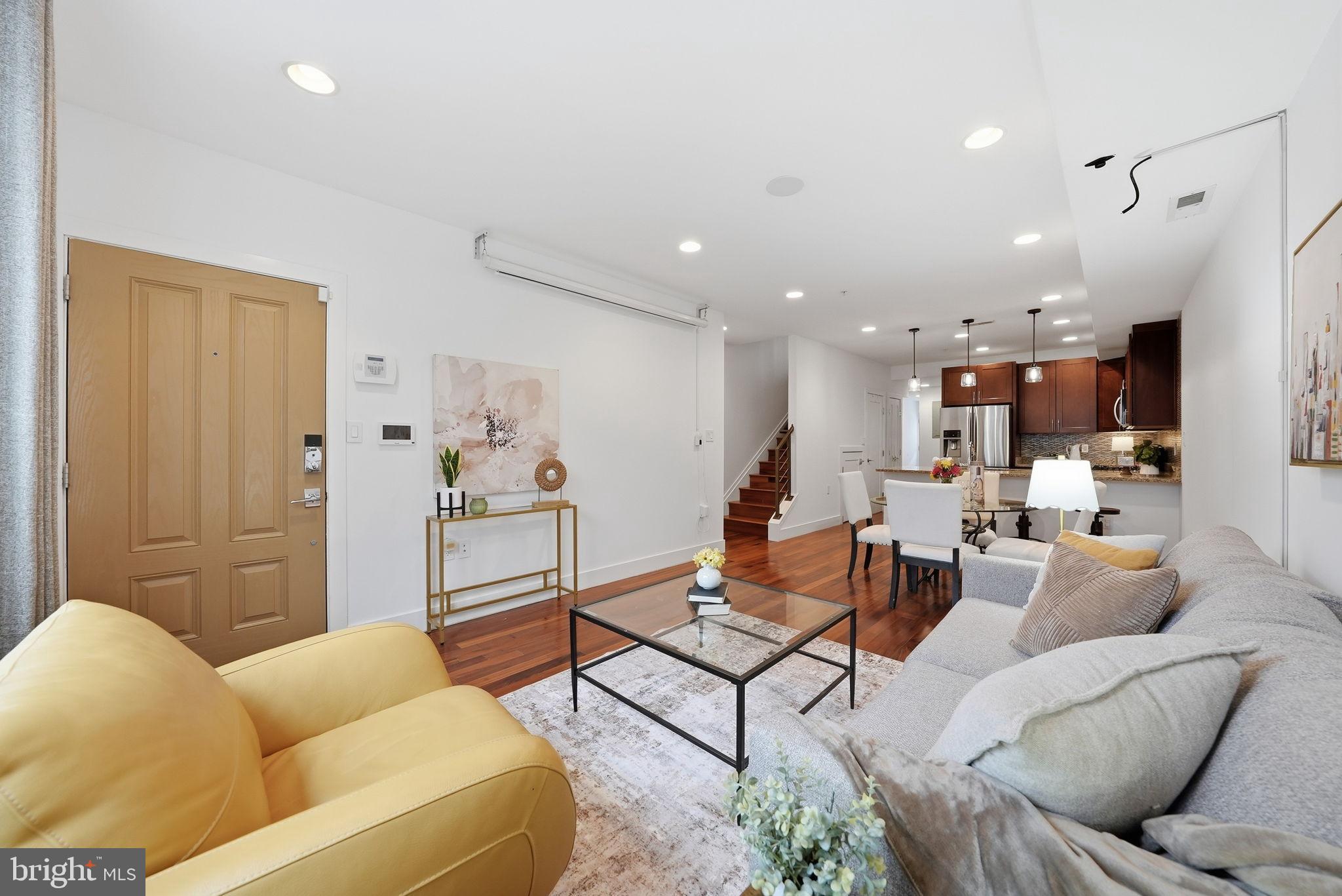 1512 F Street Northeast, Unit 2 Washington, DC 20002 - Photo 4 of 37 Bright and inviting open-concept living space.