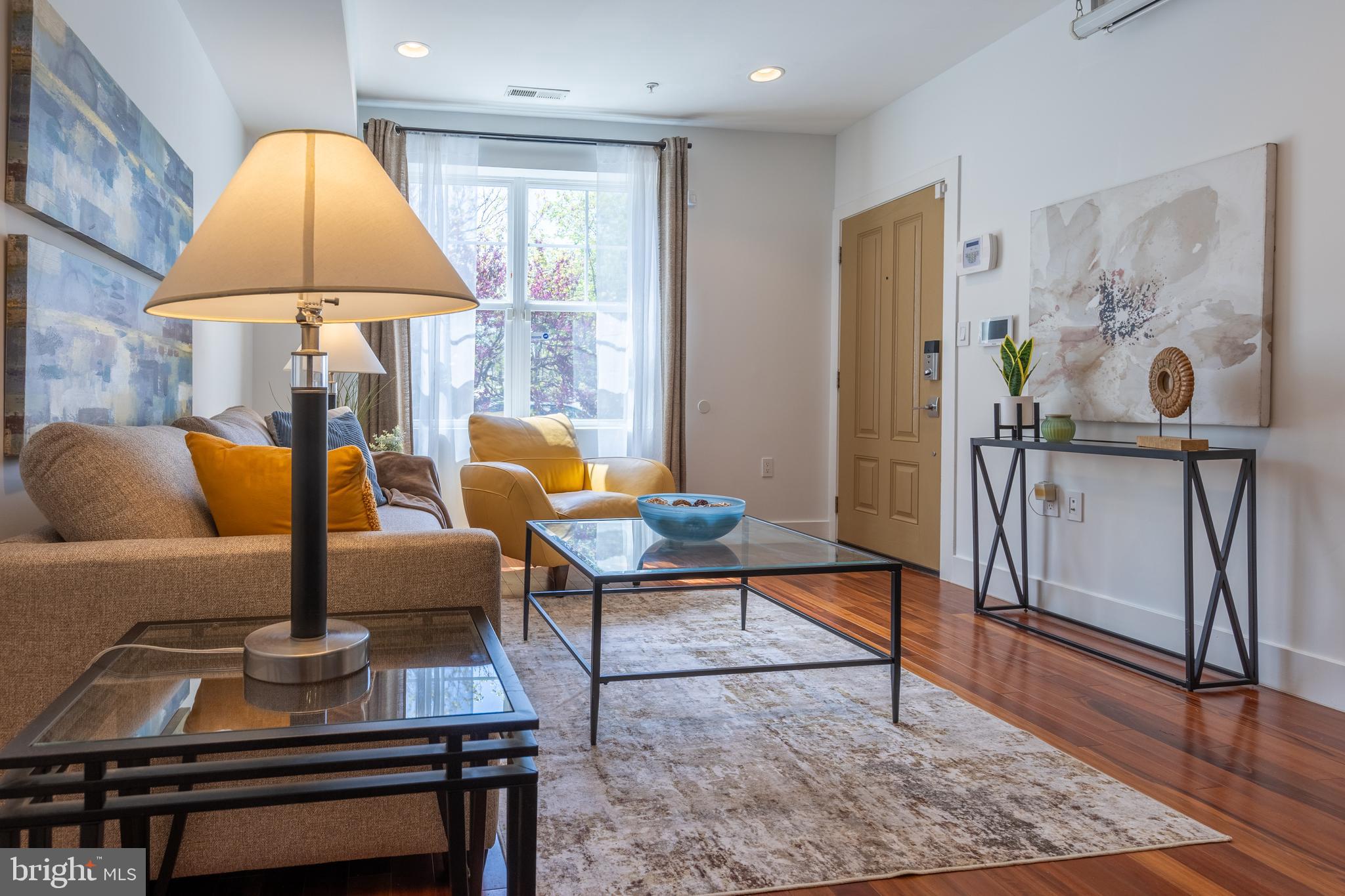 1512 F Street Northeast, Unit 2 Washington, DC 20002 - Photo 8 of 37 Bright and inviting open-concept living space.