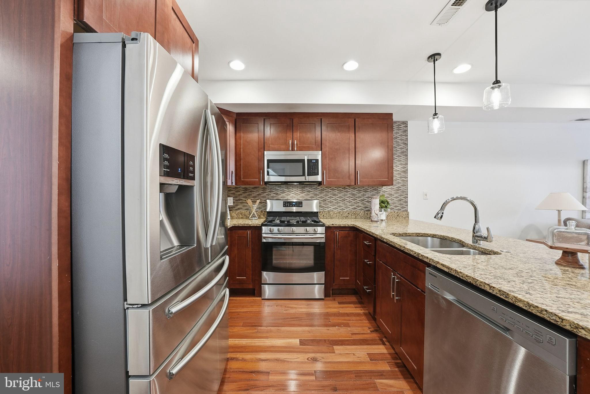 1512 F Street Northeast, Unit 2 Washington, DC 20002 - Photo 9 of 37 Modern kitchen with sleek finishes.