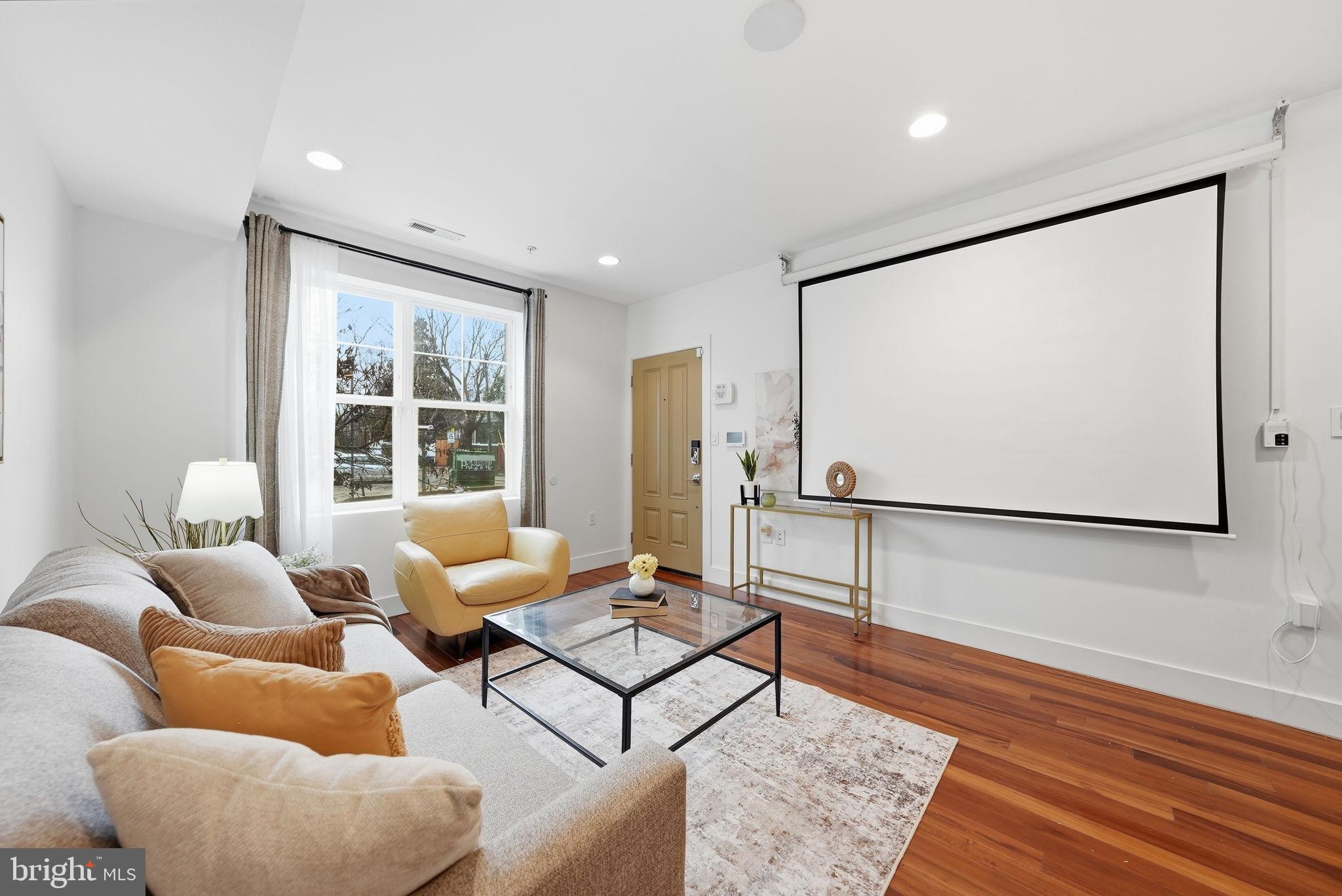 1512 F Street Northeast, Unit 2 Washington, DC 20002 - Photo 10 of 37 Bright and inviting living space with modern fl...