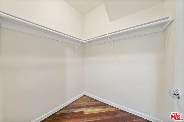 a view of a room with racks on the wall