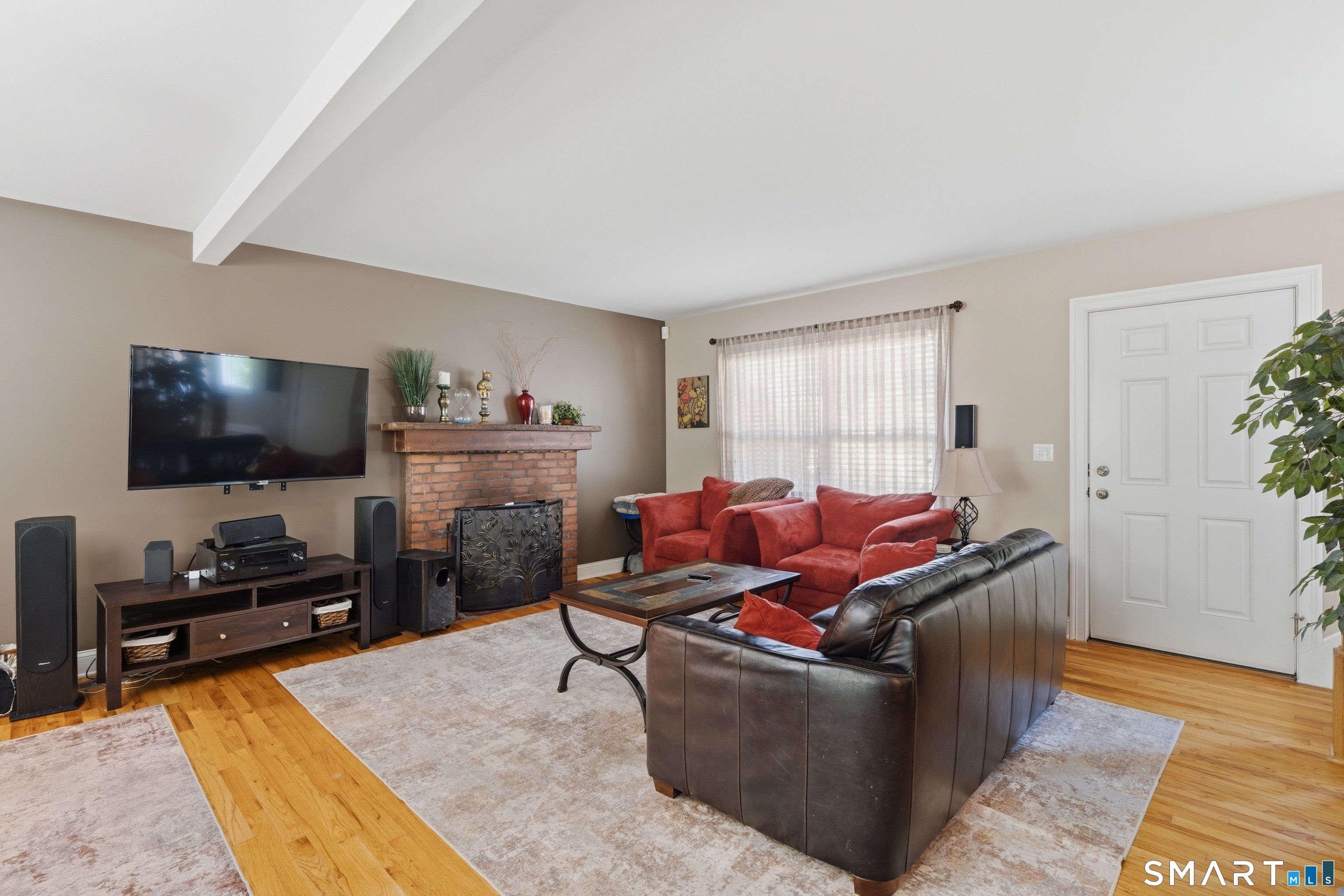 48 Case Road Burlington, CT 06013 - Photo 11 of 39 a living room with furniture and a flat screen tv