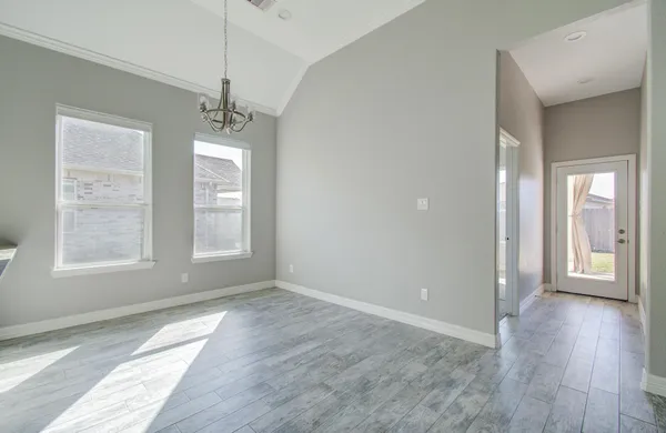 a view of livingroom with window and hardwood floor