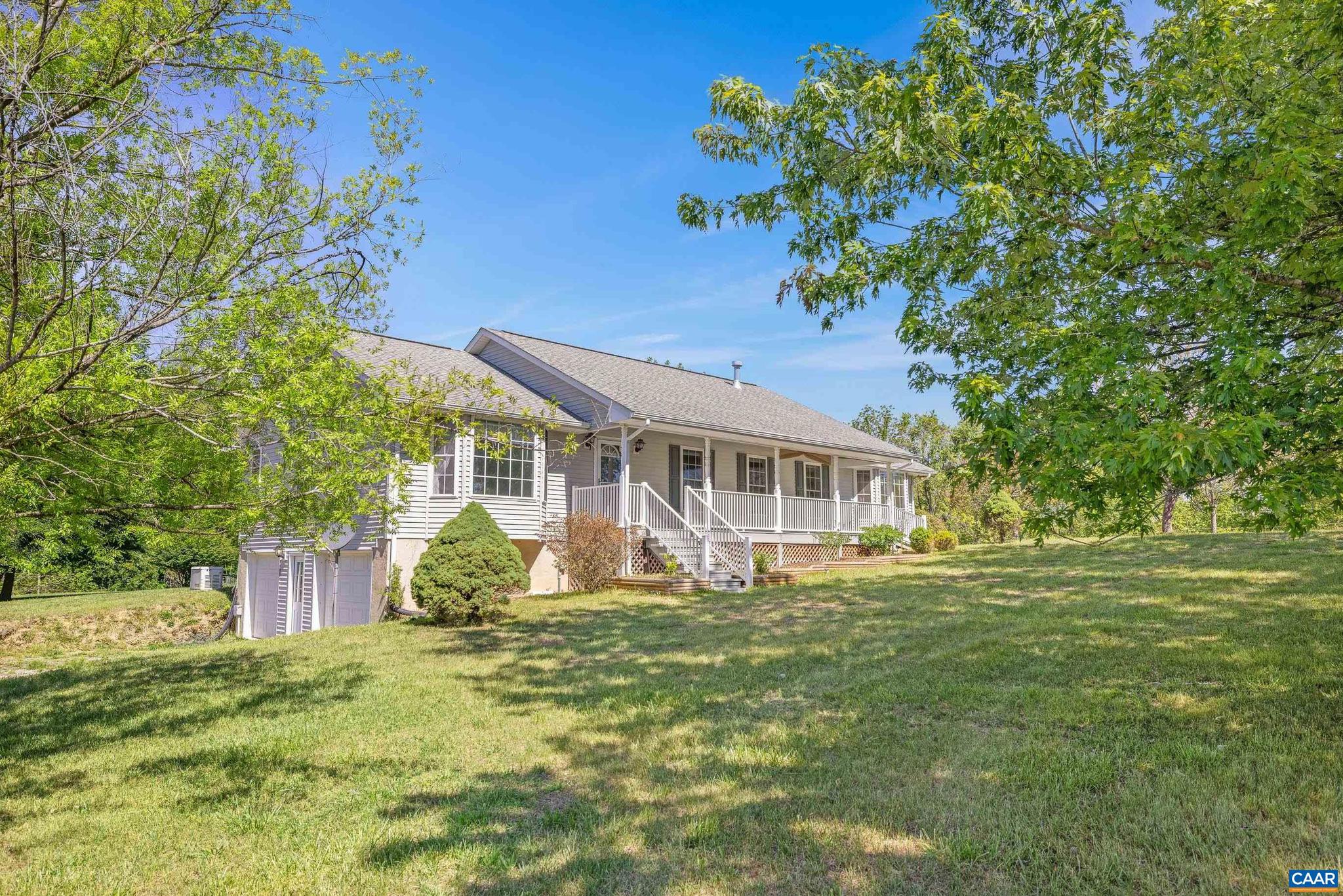 1075 Social Hall Road New Canton, VA 23123 - Photo 28 of 64 a front view of a house with garden