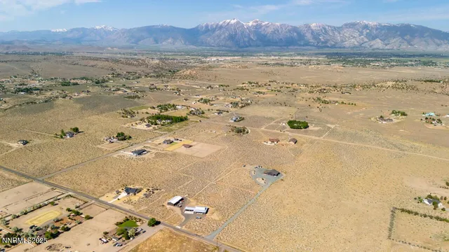 a view of an ocean and a mountain