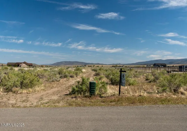 a view of a large building with a mountain in the background