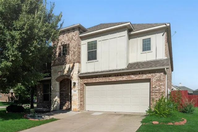 front view of a house with a street