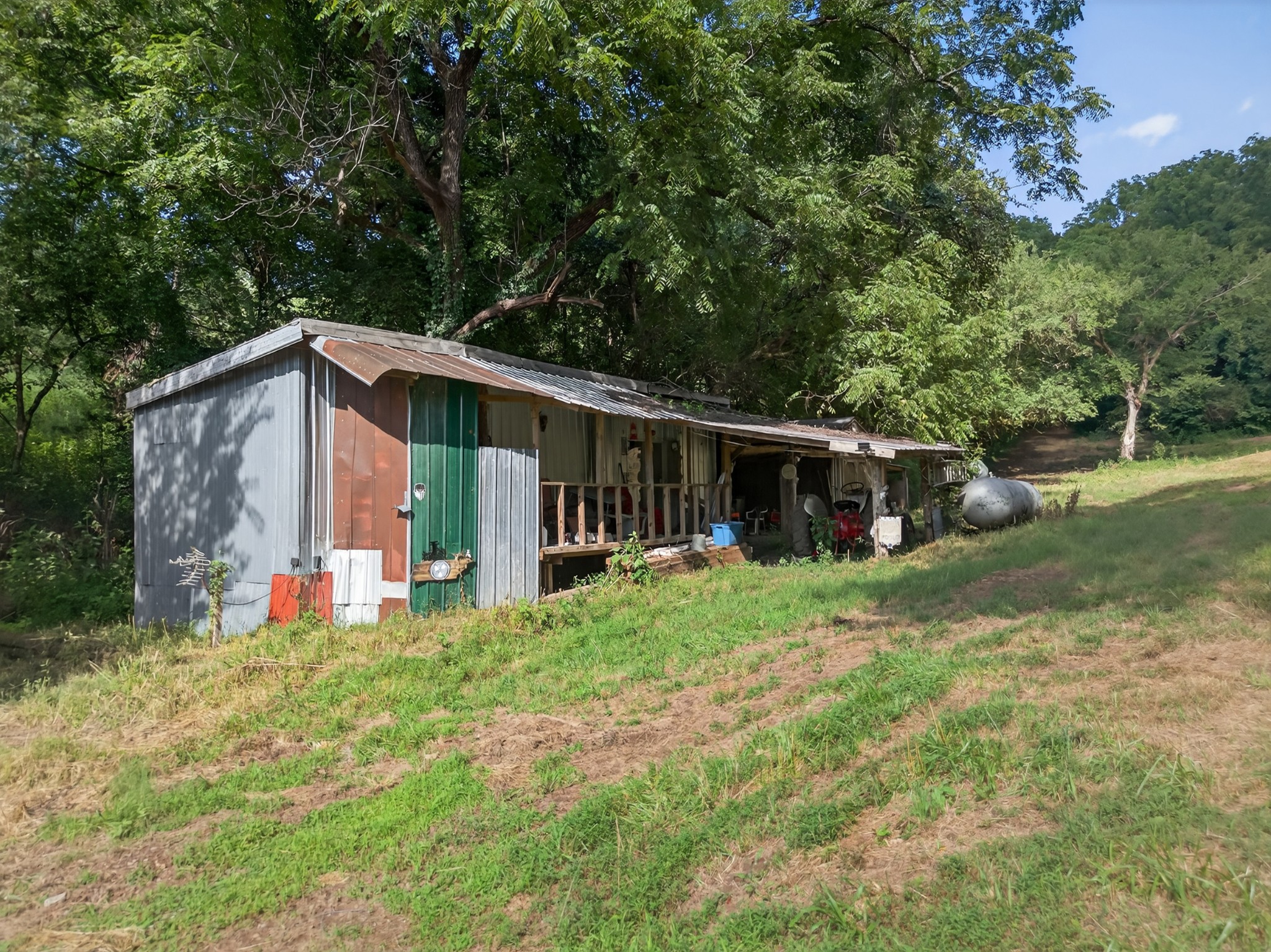 53 Daves Hollow Road Fayetteville, TN 37334 - Photo 18 of 40 a view of a house with backyard and garden