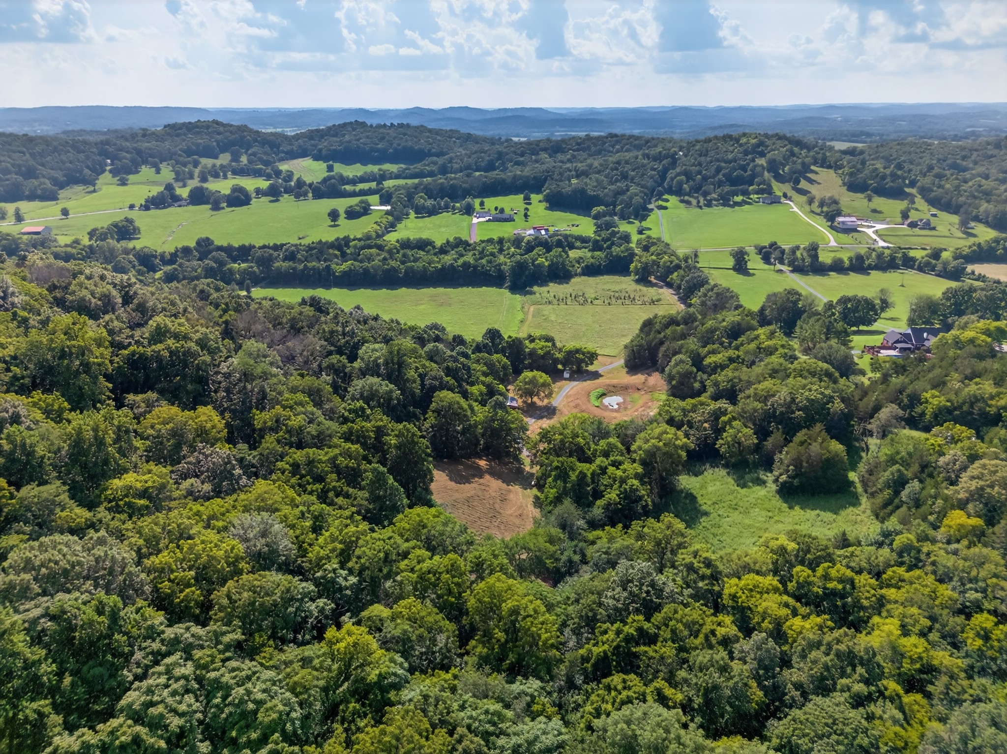 53 Daves Hollow Road Fayetteville, TN 37334 - Photo 24 of 40 an aerial view of a city with lots of residential buildings and green landscape