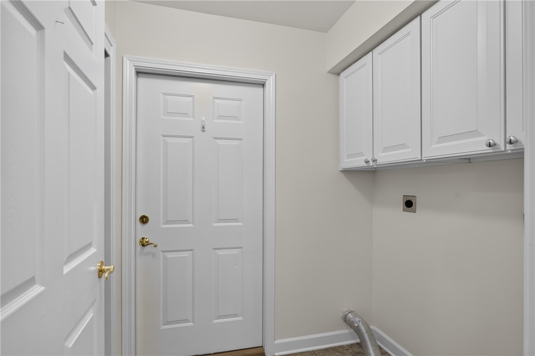 134 Life Style Lane Anderson, SC 29621 - Photo 25 of 44 Ample storage cabinetry enhances this dedicated laundry space, positioned conveniently near a main entry door.